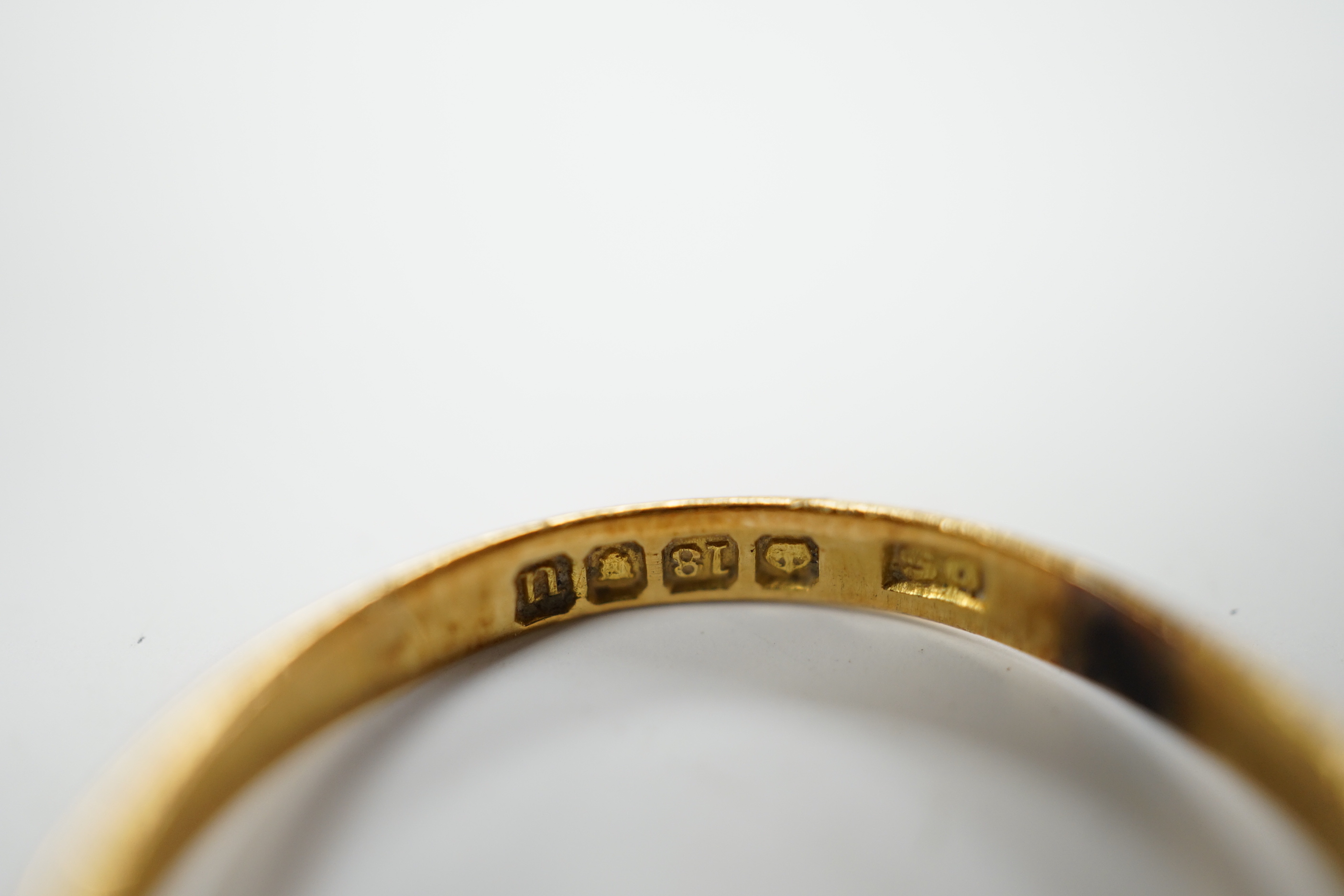 A George V 18ct gold and claw set solitaire diamond ring, size U/V, gross weight 3.6 grams.